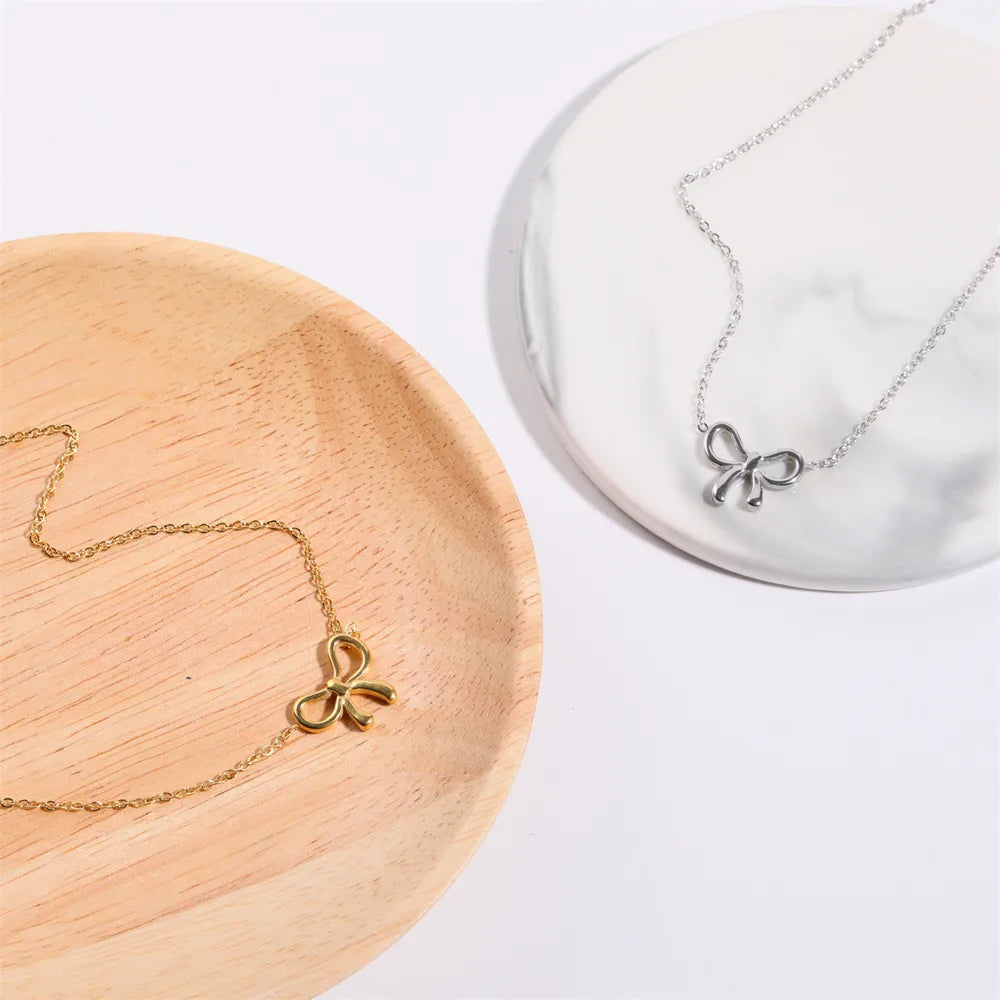 Titanium Steel Bow Pendant Necklace - Drazelle Store