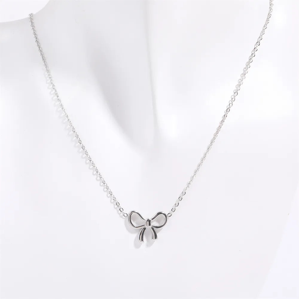 Titanium Steel Bow Pendant Necklace - Drazelle Store