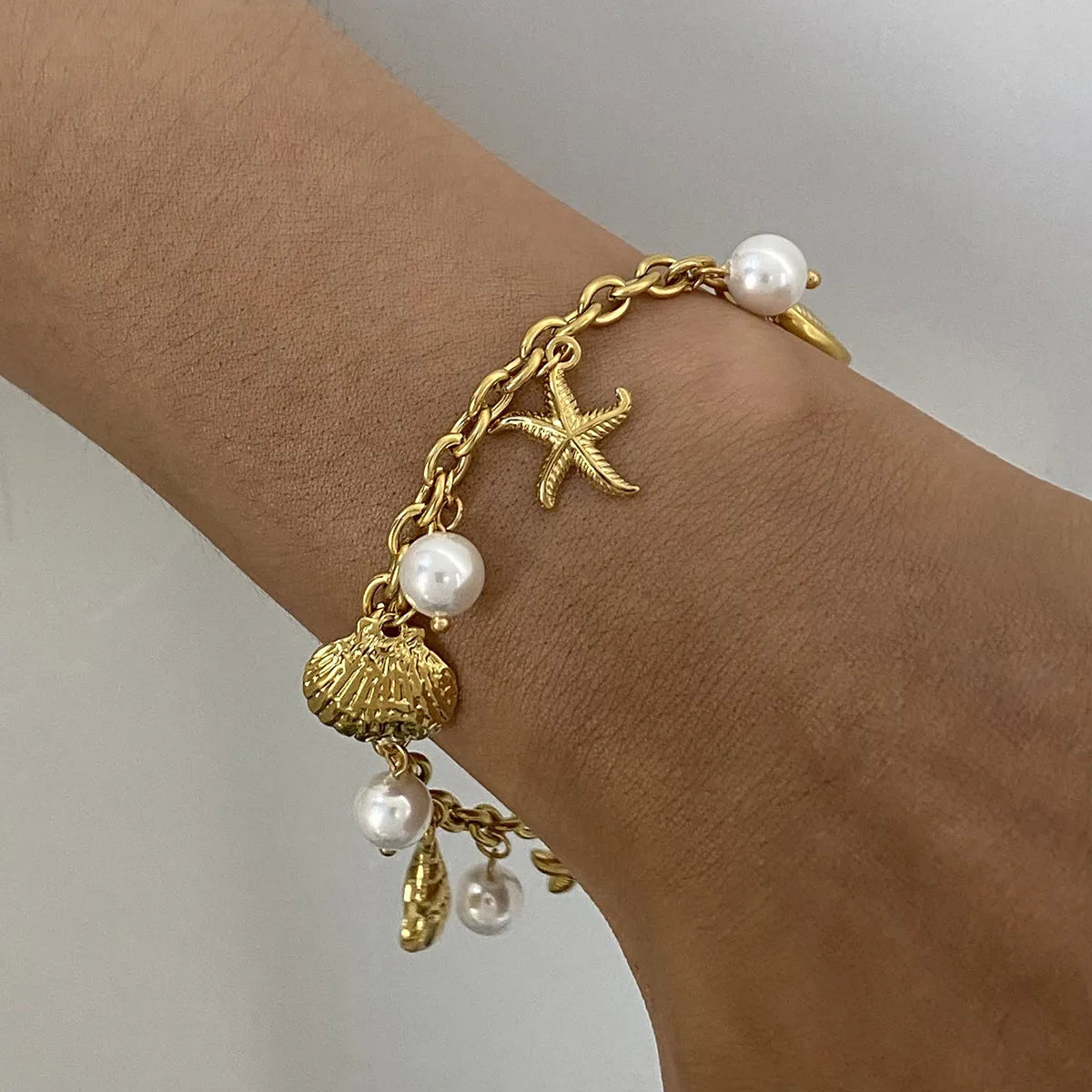 Ocean Theme Stainless Steel Chain Bracelet with Seashell and Starfish Pendants - Drazelle Store